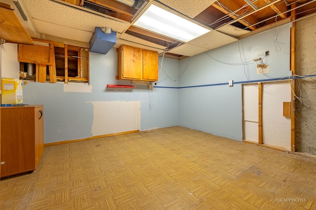 basement featuring light parquet floors