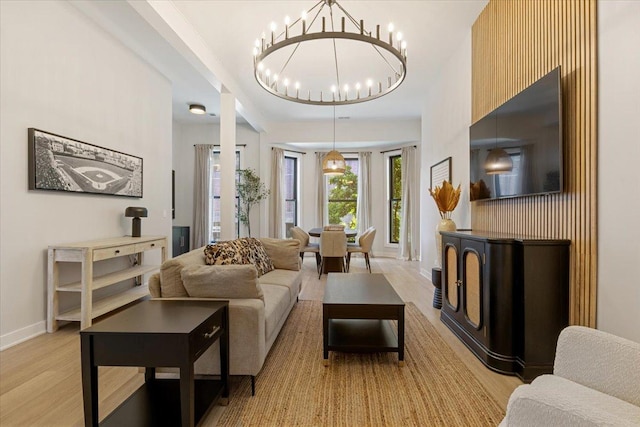 kitchen featuring open shelves, light wood finished floors, white cabinets, wall chimney exhaust hood, and appliances with stainless steel finishes