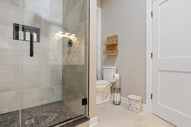 ensuite bathroom with ensuite bath, baseboards, vanity, and wood finished floors
