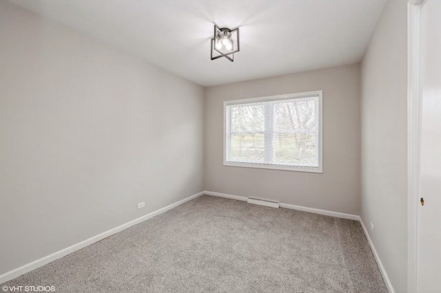 unfurnished room with carpet floors