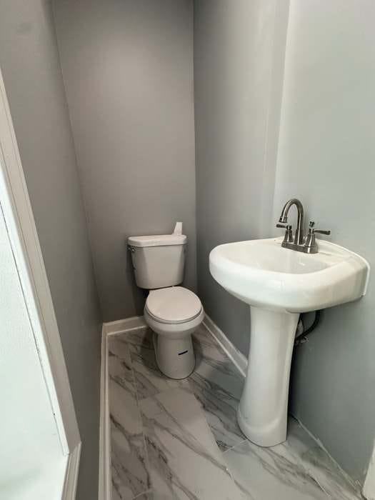 bathroom featuring toilet