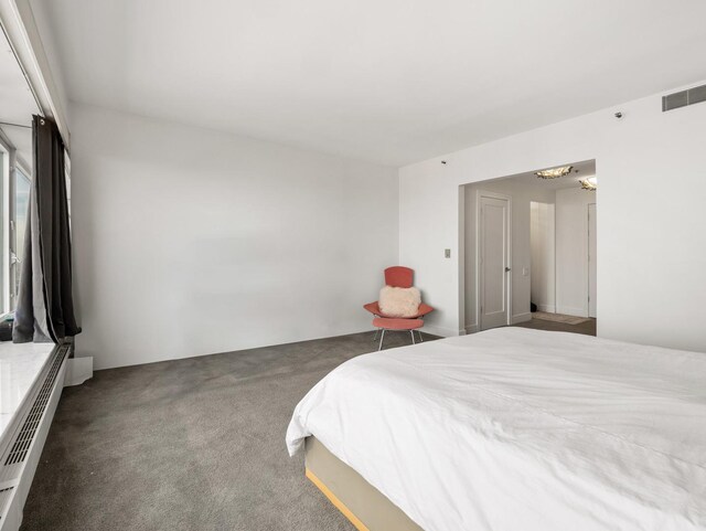 161 E Chicago Ave Unit 42H, Chicago, IL 60611 - carpeted bedroom with a chandelier