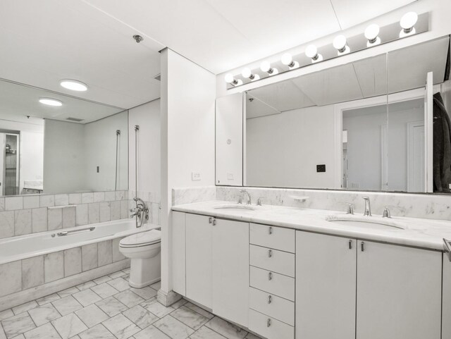 161 E Chicago Ave Unit 42H, Chicago, IL 60611 - bathroom featuring a bath, double vanity, and marble finish floors