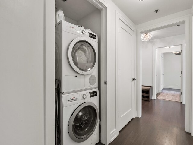 161 E Chicago Ave Unit 42H, Chicago, IL 60611 - laundry area with stacked washing machine and dryer and dark wood-type flooring