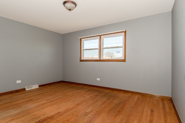 empty room featuring light hardwood / wood-style floors