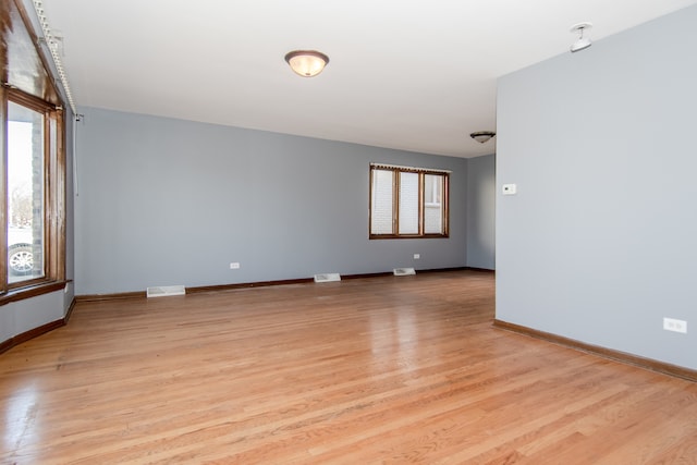 empty room featuring light wood-type flooring