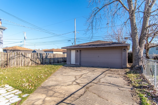 garage featuring a yard