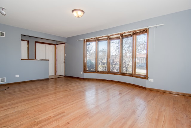 empty room featuring light hardwood / wood-style floors