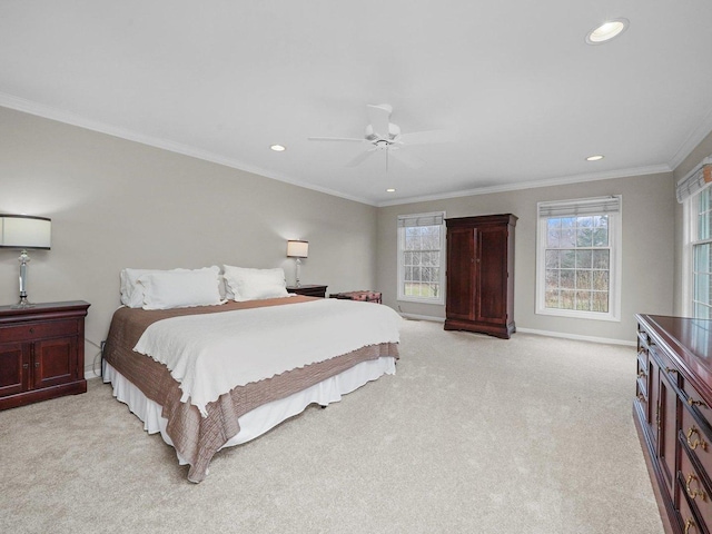 bedroom with ceiling fan, light colored carpet, and ornamental molding