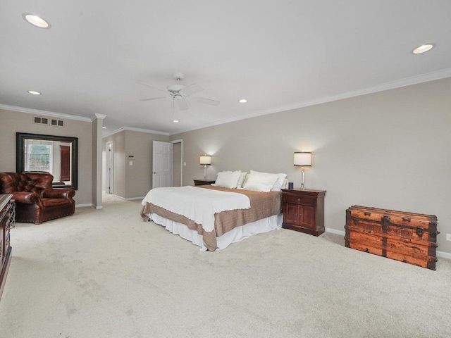 carpeted bedroom featuring ceiling fan and crown molding