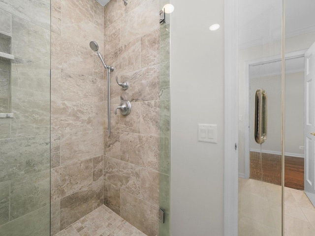 bathroom featuring tile patterned flooring and walk in shower