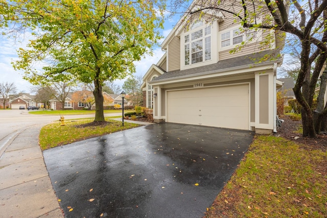 view of home's exterior featuring a garage