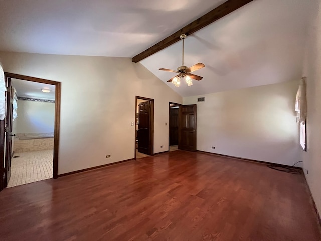 empty room featuring dark wood-type flooring, ceiling fan, and vaulted ceiling with beams