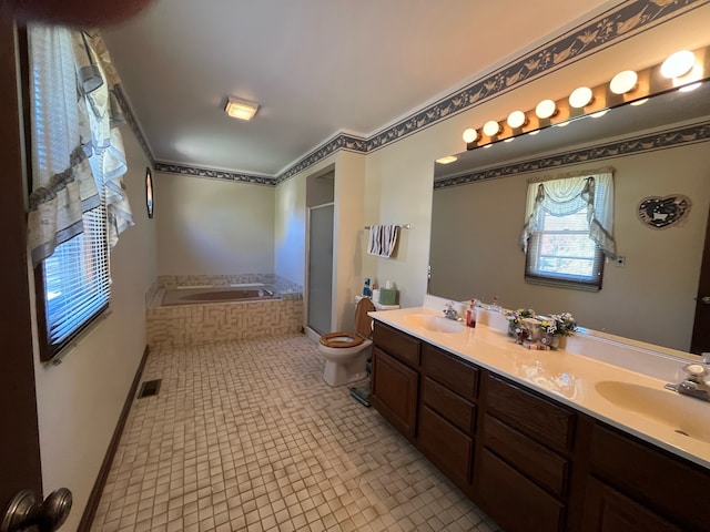 full bathroom featuring vanity, plus walk in shower, toilet, and tile patterned floors