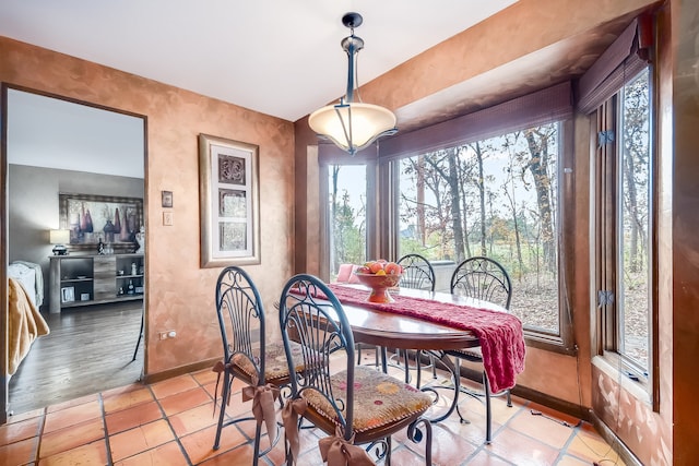 dining area with light wood-type flooring