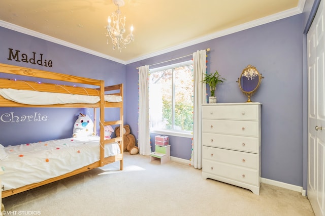 bedroom featuring a closet, carpet, crown molding, and a chandelier