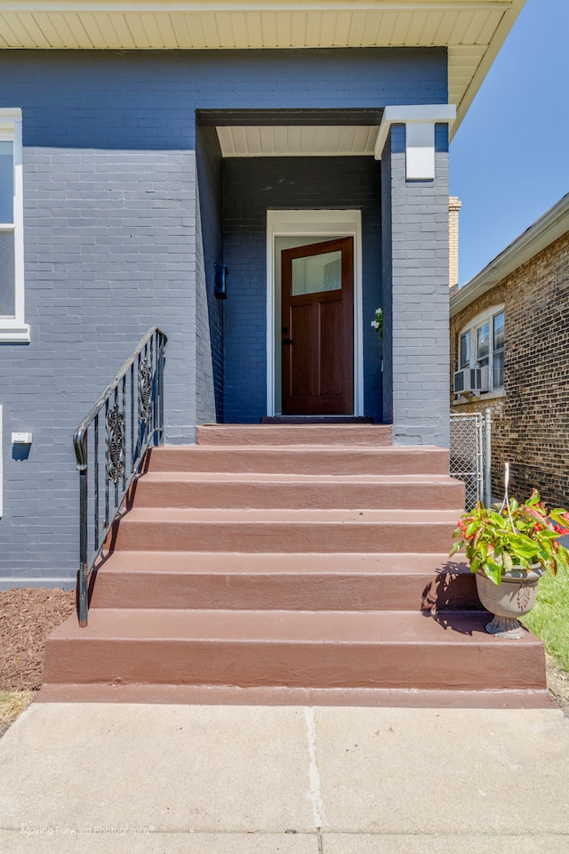 property entrance featuring cooling unit