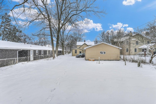 view of yard layered in snow