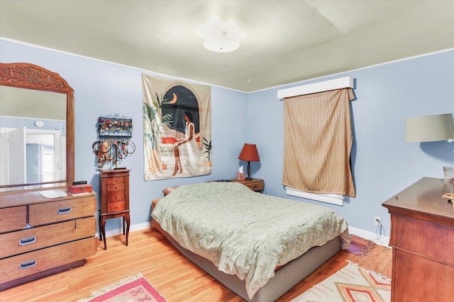 bedroom featuring light wood-type flooring