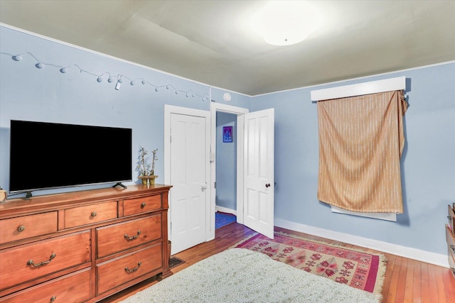 bedroom featuring hardwood / wood-style floors