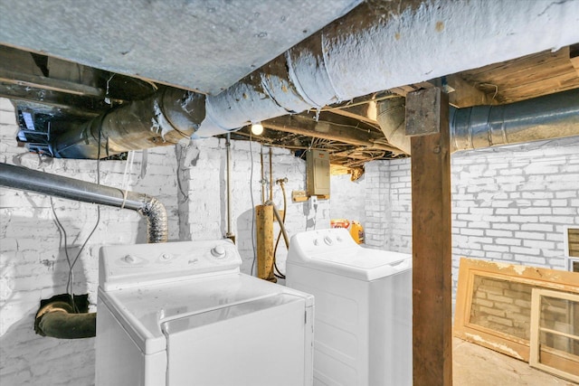 clothes washing area with independent washer and dryer