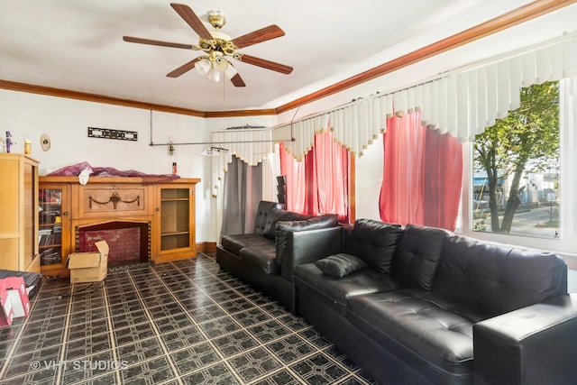 living room with ornamental molding and ceiling fan