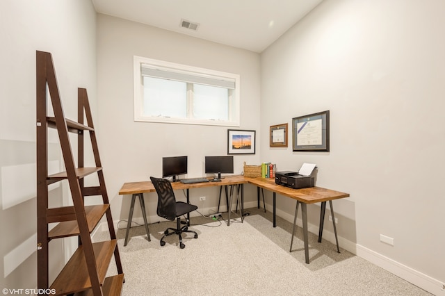 home office with light carpet