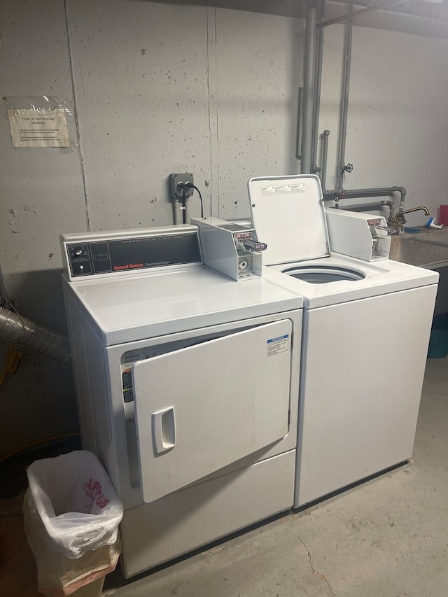 laundry room featuring washing machine and clothes dryer