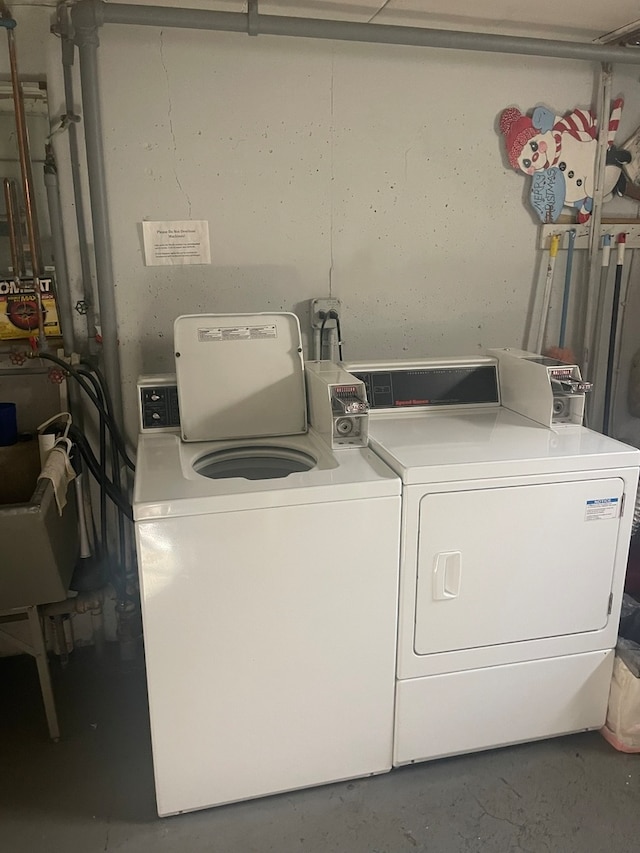 laundry room featuring separate washer and dryer