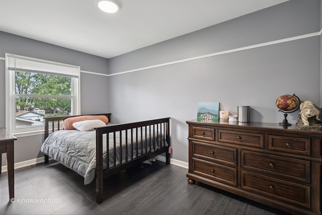 bedroom featuring dark hardwood / wood-style floors