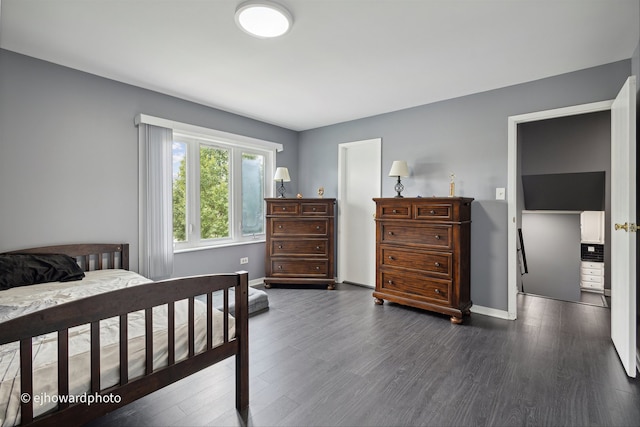 bedroom featuring dark hardwood / wood-style floors