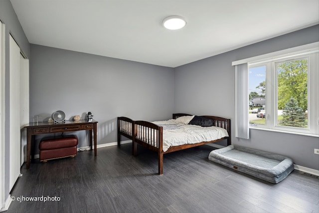 bedroom featuring dark hardwood / wood-style floors