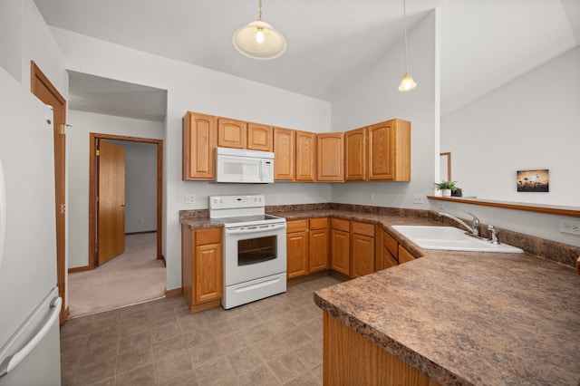 kitchen with white appliances, high vaulted ceiling, sink, and pendant lighting