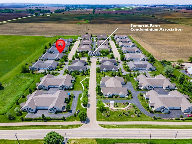 birds eye view of property featuring a rural view