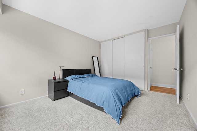 bedroom featuring a closet and carpet floors