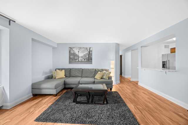 living room featuring wood-type flooring