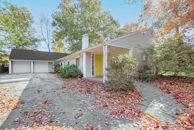 single story home with a garage