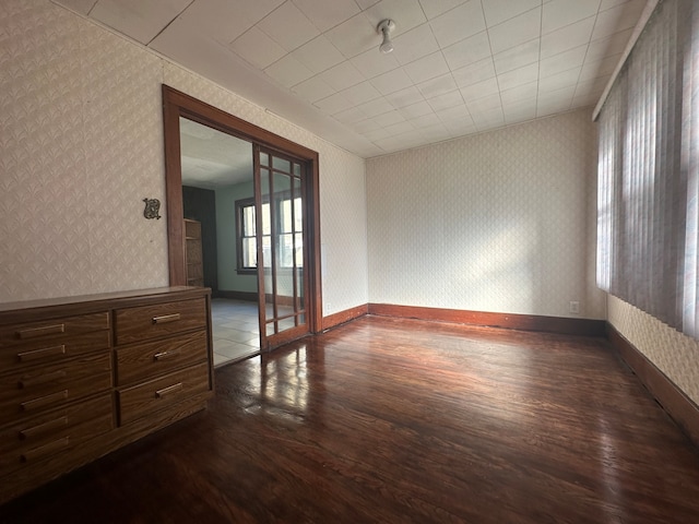 empty room featuring dark hardwood / wood-style floors