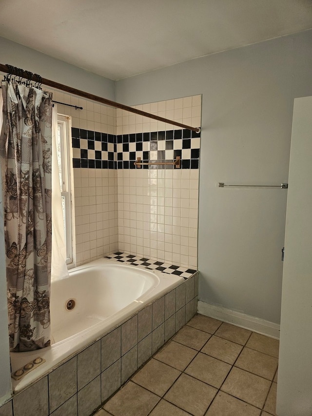 bathroom with separate shower and tub and tile patterned flooring