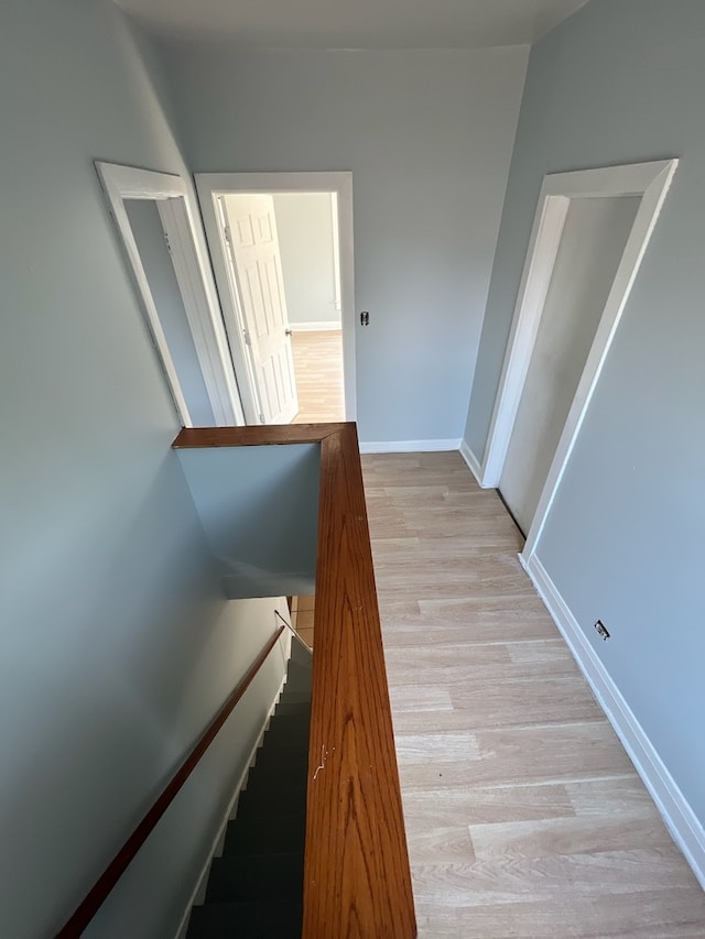 stairway featuring hardwood / wood-style flooring