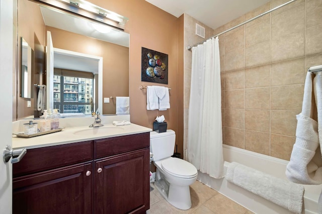 full bathroom with vanity, shower / bath combination with curtain, toilet, and tile patterned floors