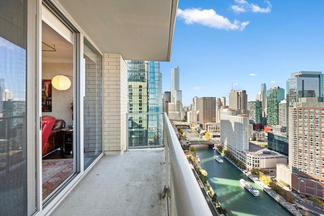 balcony featuring a water view