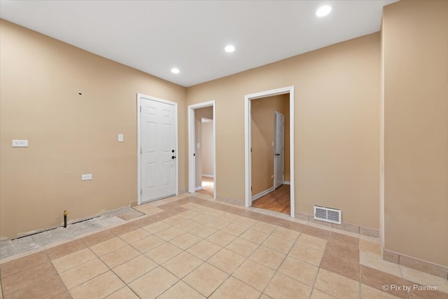 entrance foyer featuring light tile patterned floors