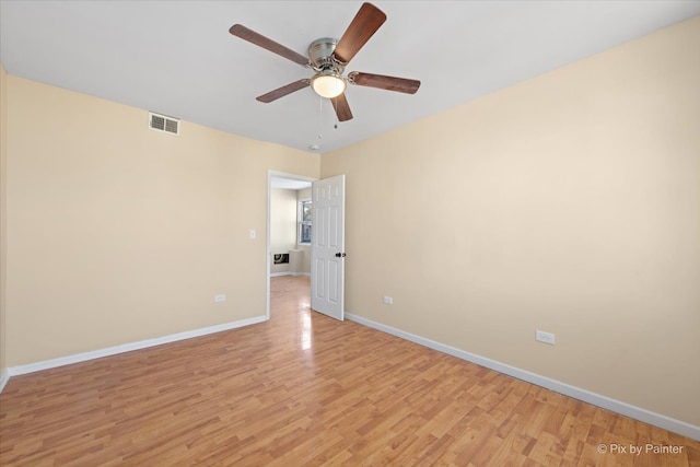 unfurnished room featuring light hardwood / wood-style floors and ceiling fan