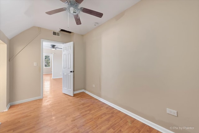 bonus room with light hardwood / wood-style floors and lofted ceiling