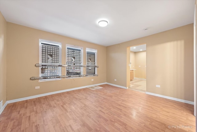 empty room with light wood-type flooring