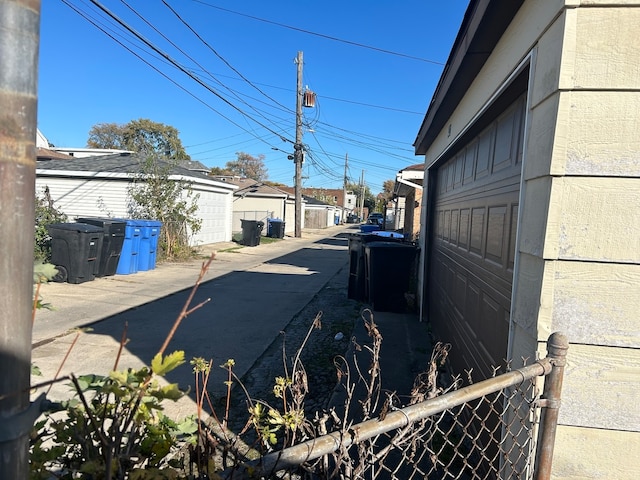 view of side of home with a garage