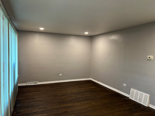 empty room featuring hardwood / wood-style floors