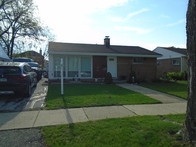 8252 N Octavia Ave, Niles, IL 60714 - bungalow-style home featuring a chimney, brick siding, and a front yard