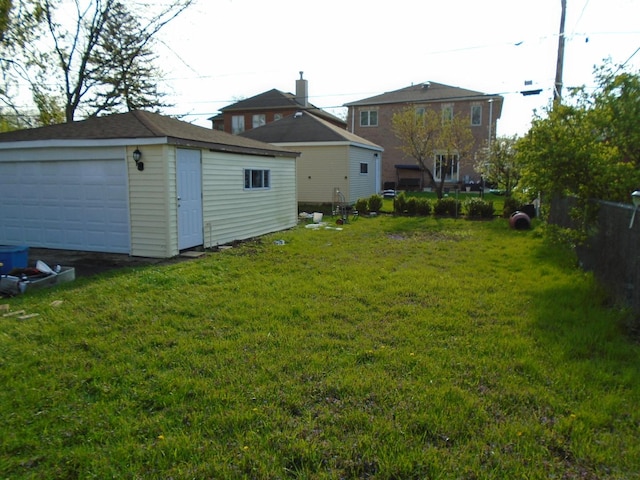 8252 N Octavia Ave, Niles, IL 60714 - view of yard featuring a detached garage and an outdoor structure